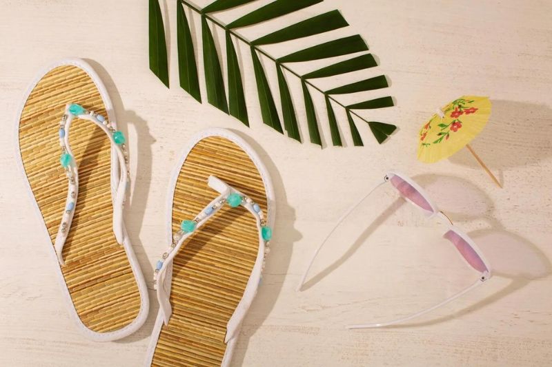 Flip flops and sandals are great for a laid back, beachy vibe, while espadrilles or loafers can offer a more polished look for a formal venue