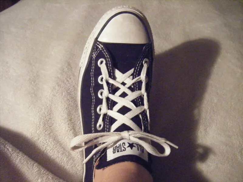 Instructions on how to tie converse shoe laces to hide spider web laces