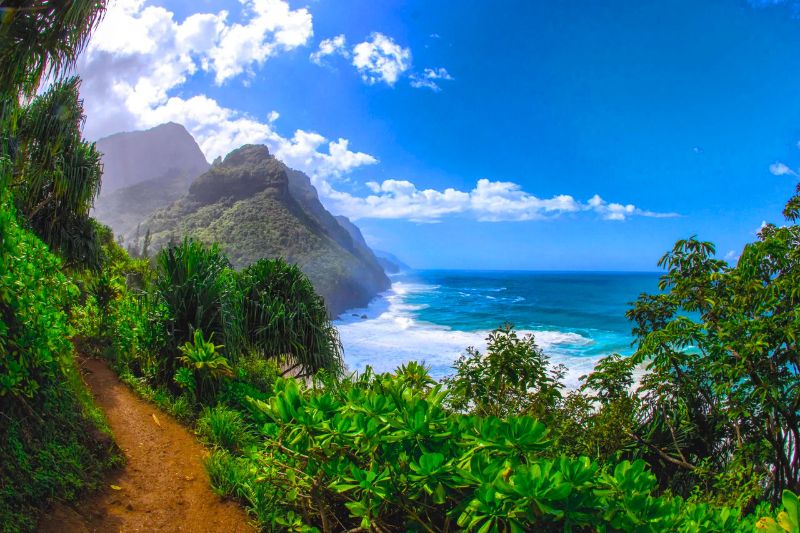 Kauai, often referred to as the “Garden Isle,” is perfect for travelers who want to immerse themselves in nature and enjoy a slower pace