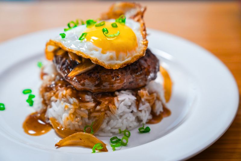 Loco Moco is a comforting dish that embodies the multicultural influences on Hawaiian cuisine